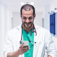 man-doctor-looking-at-smartphone--sm