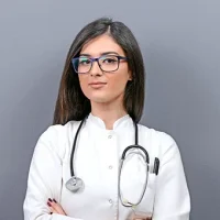 woman-doctor-with-glasses-standing--sm